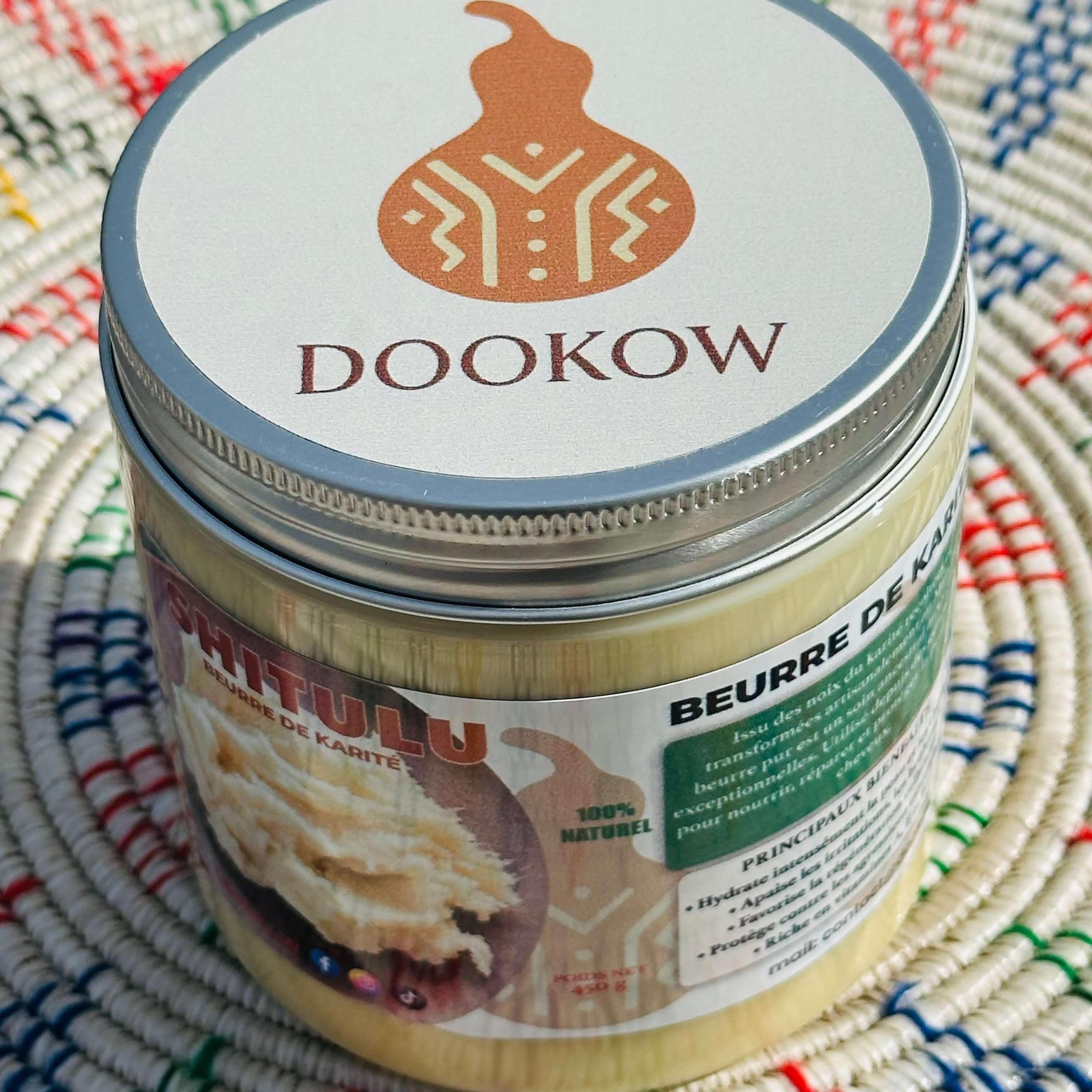 Beurre de karité Dookow dans un pot transparent, ultra-hydratant et riche en vitamines pour peau et cheveux